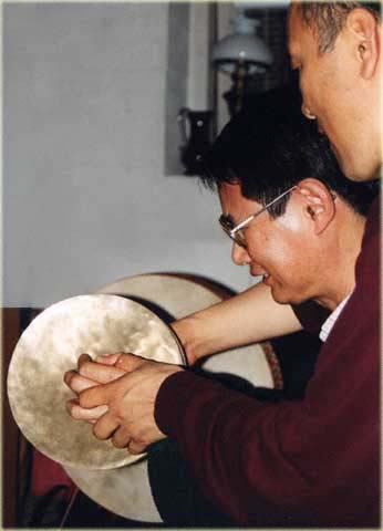 Lama Tashi and Tsewang training sinjens for Mahakala 